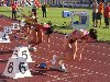 Athletes leaving starting blocks for a 200 meters race (2010 Josef Odlozil ...
