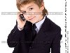 Мальчик в строгом костюме с телефоном в руках, изолировано, фото № 157521, ...
