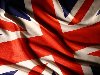Флаг Великобритании обои, фото Развивающийся на ветру флаг картинки