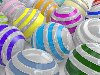 Яркие цветные шарики в формате 3D пленяют взор разноцветными спиралями.