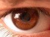 Коричневые глаза по-английски называются brown и выглядят примерно так или ...