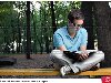 Молодой человек читает книгу в парке, фото № 1982368, снято 26 августа 2010 ...