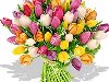 Яркий букет весенних цветов из разноцветных тюльпанов.