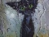 Фото Грустный чёрный кот смотрит на дождь за стеклом