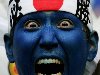Дортмунд, Германия – 22 июня: японский фанат с раскрашенным лицом на матче ...