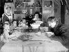 Семья Чуковских в Куоккале. За столом слева направо: Лида, Коля и Боба, ...