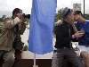 Фотограф снимает целующихся парней во время гей-парада в Софии. (Stoyan ...