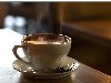 дымящаяся чашка горячего кофе. «Druen» p? Aker Brygge / автор boinorge